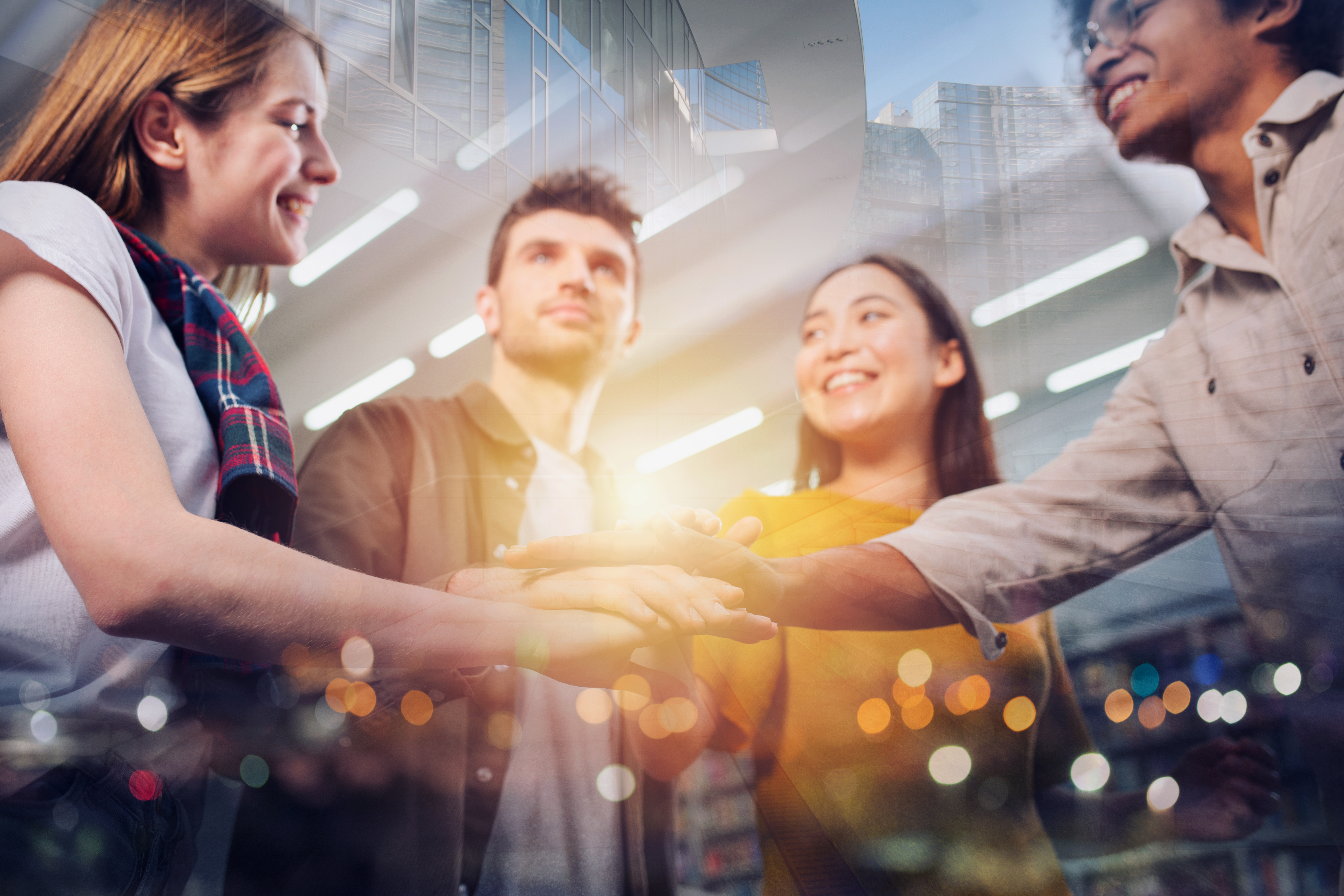 Business person put their hands together. Concept of teamwork and partnership. Double exposure